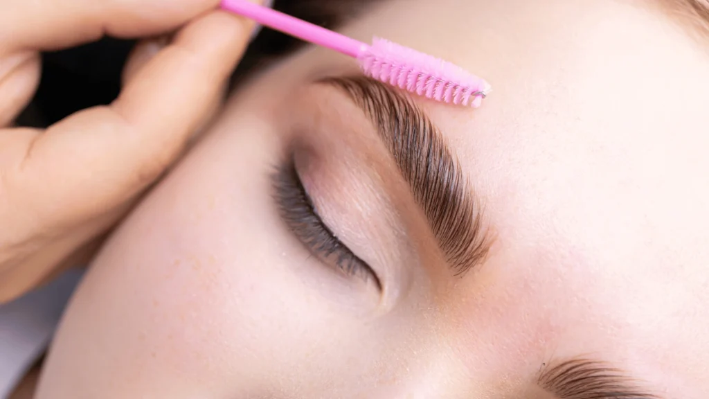 Client with freshly done Brow Lamination + Colour for fuller, shaped, and tinted brows at Graceful Eyes Studio.